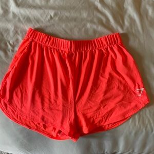 Orange gymshark mesh shorts